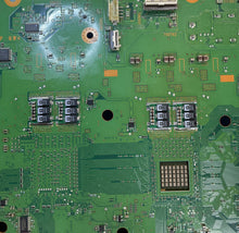Large green console mainboard photographed from above